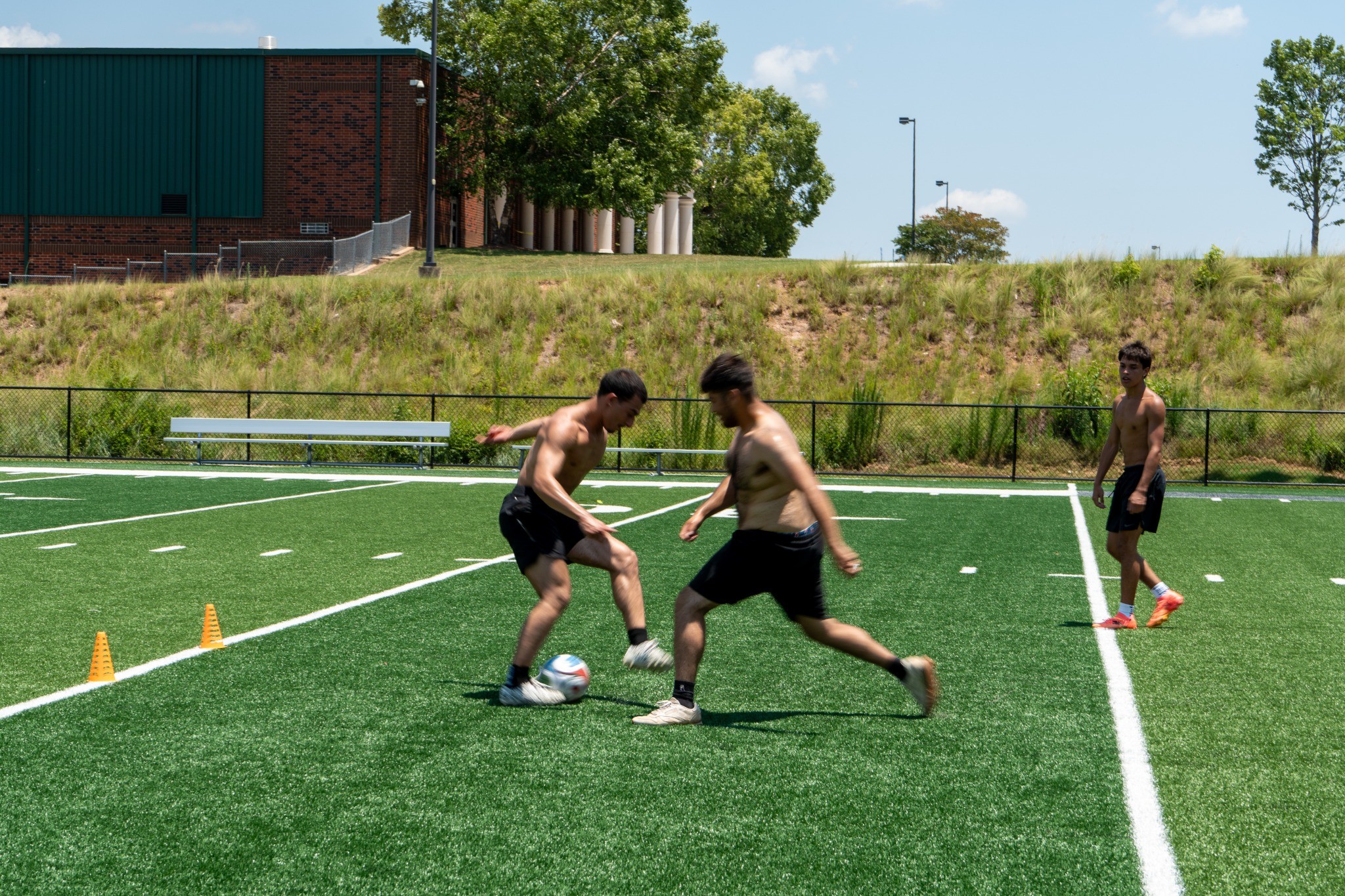 Players competing for the ball — photography by Andrew Frady